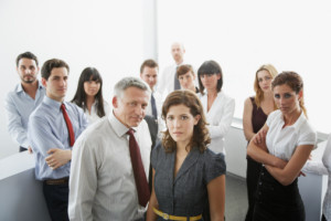 Businesspeople posing in office